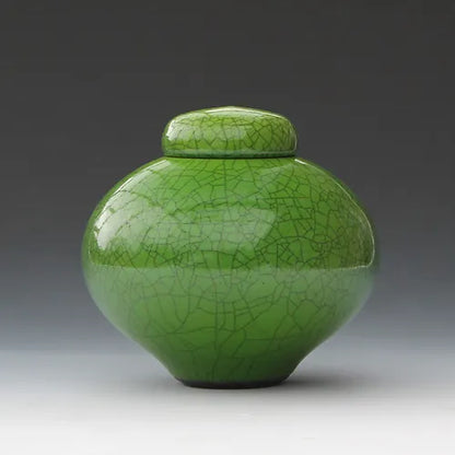 Imperial green raku lidded jar, side