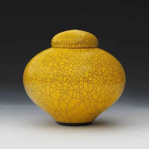 Imperial yellow raku lidded jar, side