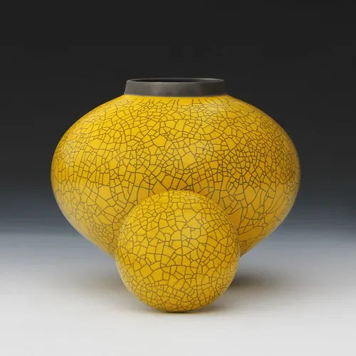 Imperial yellow raku lidded jar,  open cap side