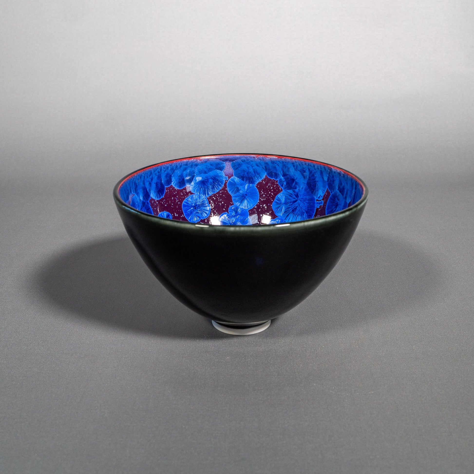 Purple and blue crystalline bowl, side